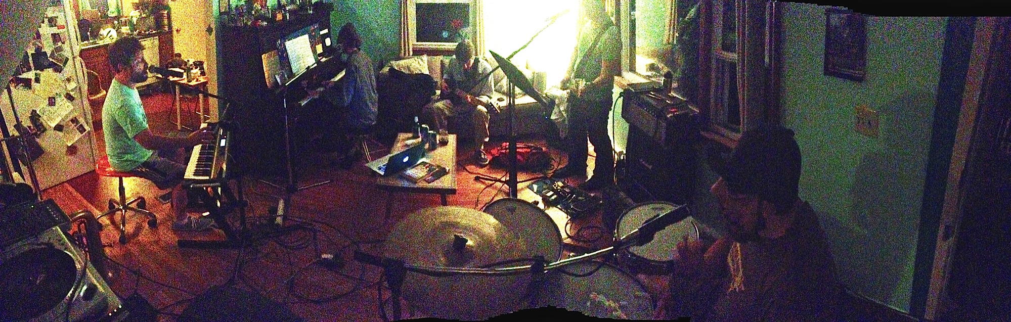Pragnus Gray Collective prepares for the CD release performance at Adam's house.